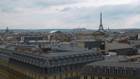 View-big-panorama-Paris,-the-Opera-Garnier,-south-western-part,-city-center,-Eiffel-Tower---from-famous-rooftop-restaurant-of-Galeries-Lafayette-in-Paris,-France