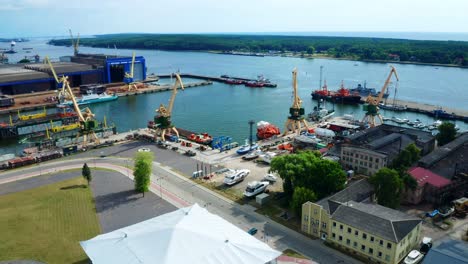 Aerial-View-Of-Port-Of-Klaipeda-with-docked-ships-and-loader-crane---Lithuania