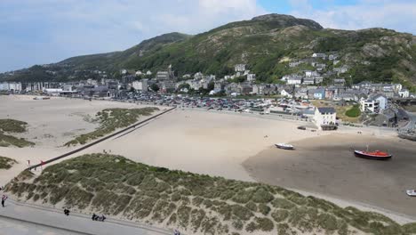 Barmouth-beach-North-Wales,-UK-seaside-town-aerial-footage