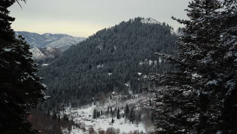 Tilt-up-revealing-Sundance-Ski-Resort-from-the-Stewart-Falls-hike-through-trees