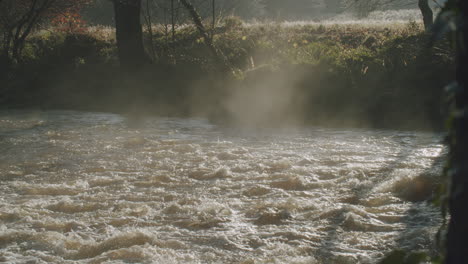 North-York-Moors,-River-Esk-in-full-flow-flood,-mist-on-water-Late-Summer,-Autumn-time,-Slow-motion---Clip-16