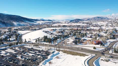 View-Of-The-Cars-Driving-Around-Steamboat-Springs-Ski-Resort-In-Colorado-During-Wintertime