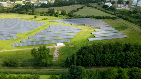 Solar-Panels-In-Aerial-View-Near-Gdansk,-Pomerania,-Poland---drone-shot