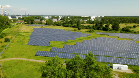 Aerial-shot-above-solar-panel-renewable-energy-farm-outside-rural-town-in-Poland