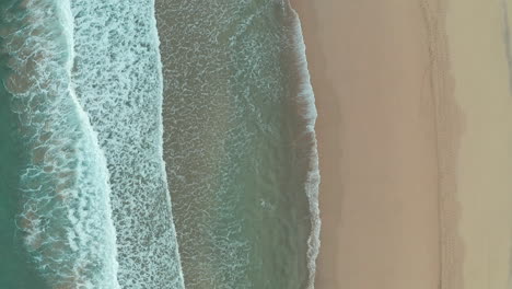 aerial-drone-beach-portosanto-madeira-calm-waves-topdown-drone