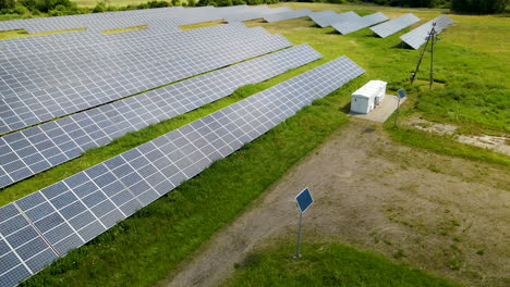 Green-energy-solar-panel-farm-with-sunlight,-photovoltaic-renewable-power