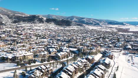 Bird's-Eye-View-Of-Steamboat-Springs-Town-And-City-On-A-Sunny-Winter-Day-In-Colorado,-USA