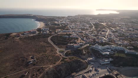 Aerial-view-of-Sagres-cityscape-and-coast-during-sunset