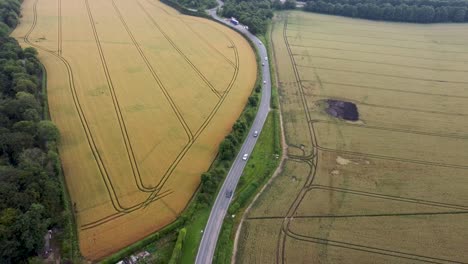 4K-drone-view-of-a-country-road-with-light-traffic