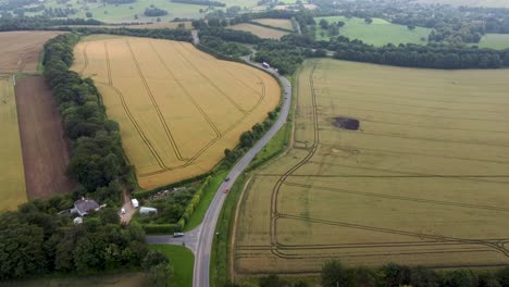 4K-drone-video-capturing-a-bendy-road-in-countryside-in-Kent-England