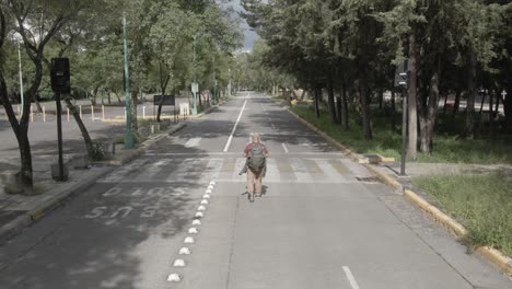 Pull-front-in-alone-streets-with-only-one-person,-without-cars,-in-pandemic-era-in-Mexico-City