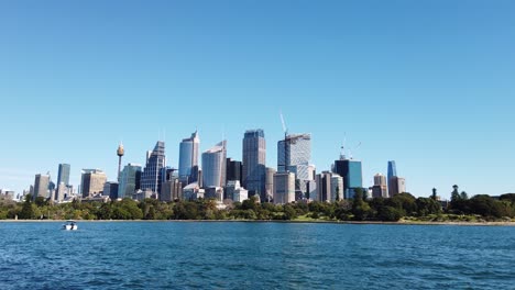 View-Of-CBD-High-rise-Buildings-Of-Sydney-City-Across-The-Waters-From-The-Botanical-Gardens-In-NSW,-Australia