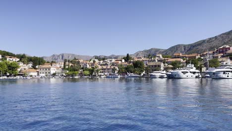 Sunny-Cavtat-marina-with-town-panorama-from-the-Adriatic,-Croatia