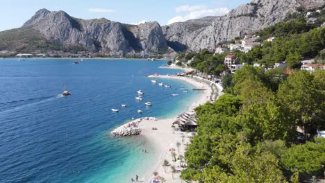 An-aerial-view-over-stunning-beach-on-the-Adriatic-in-Omis,-Croatia
