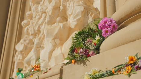 Bouquets-Of-Fresh-Flowers-On-The-Exterior-Wall-Of-Cathedral-Basilica-Of-Our-Lady-Of-The-Pillar