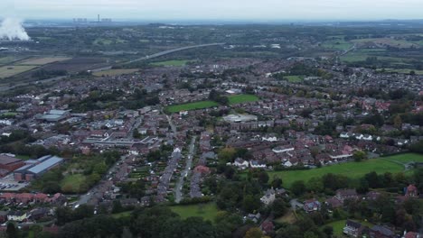 Aerial-view-above-Halton-North-England-Runcorn-Cheshire-countryside-industry-landscape-panning-right-shot