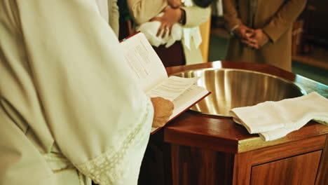 Catholic-Priest-Reads-Bible-Prior-to-Baby's-Baptism