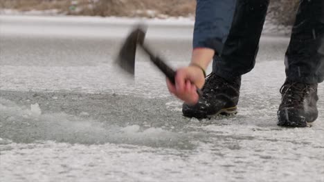 Person-breaking-ice-in-slow-motion