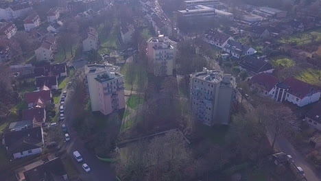 Aerial-top-down-shot-of-three-residential-blocks-in-poor-german-district-during-sunny-day