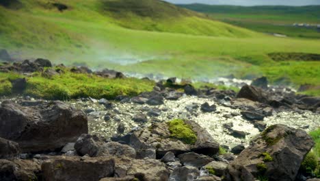 Light-Smoke-From-The-Rocky-Stream-Amidst-The-Rugged-Terrain-In-Reykjadalur-Valley-In-Iceland