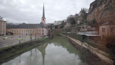 Alzette-River-With-Neumunster-Abbey-At-Grund,-Luxembourg-City-From-Stierchen-Bridge