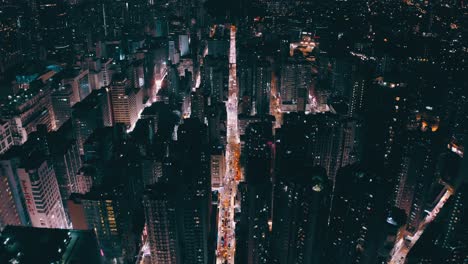Cinematic-drone-shot-of-a-city-during-the-night-giving-that-cyberpunk-vibe