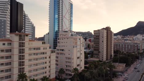 Beautiful-paning-drone-clip-of-luxurious-hotels-and-apartment-blocks-in-the-city-of-Calpe-in-Spain
