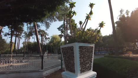 Limassol-Municipal-Park-ornamental-vase-near-walkway--Wide-tracking-shot