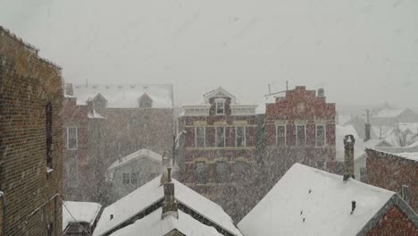 Picturesque-Urban-Brick-Buildings-during-Heavy-Snowfall-in-Winter