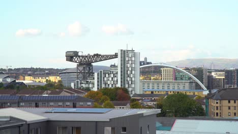 Aerial-wide-static-of-Glasgow's-Armadillo,-Finnieston-Crane-and-Squinty-Bridge-from-afar