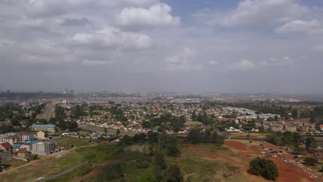Suburbs-and-skyline-of-Nairobi-city-capital-of-Kenya,-aerial-panorama