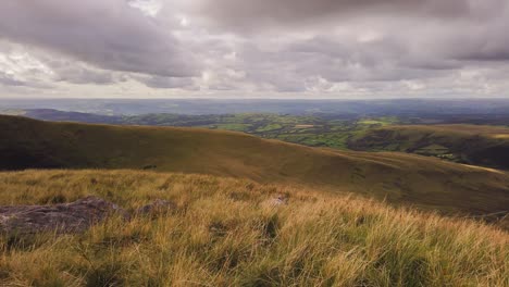 Colorful-landscape-of-Brecon-Beacons-National-Park-in-Wales-during-grey-cloudy-day,timelapse