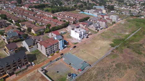 Residential-area-at-suburbs-of-Nairobi-capital-of-Kenya,-aerial-view