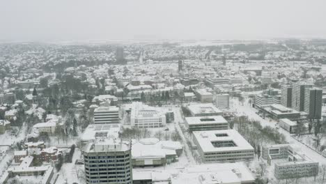 Drone-Aerial-views-of-the-student-town-Göttingen-during-winter-2021-in-heavy-snowfall
