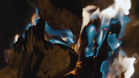 campfire-close-up,-fire-burning-in-slow-motion-during-camping-trip