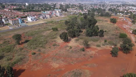 Suburb-landscape-of-Nairobi,-residential-area-near-Langata-cemetery,-aerial-view