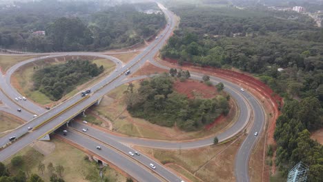 Traffic-on-interchange-of-Nairobi-Southern-Bypass-Highway-in-Kenya,-aerial-view