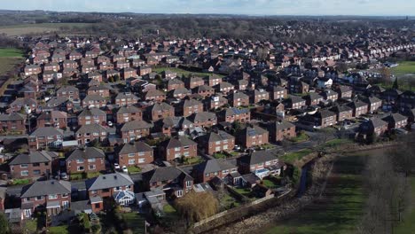Typical-Suburban-village-residential-neighbourhood-Birmingham-townhouse-rooftops-aerial-view-descending-pan-left