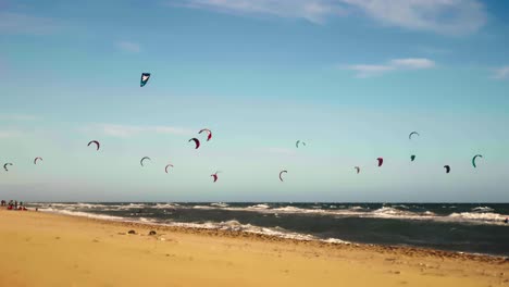 Beach-with-kite-surfers-on-the-background-at-Marbella,-south-of-Spain
