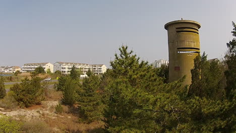 Low-aerial-shot-moves-backward-from-World-War-II-watchtower