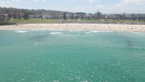 People-Enjoying-Blue-Sea-And-Bondi-Beach-At-Summer---Sydney,-NSW,-Australia