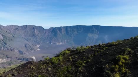 drone-fly-above-Mount-Tambora,-Sumbawa,-Indonesia-reveal-valley-unpolluted-wild-nature-during-a-sunny-day