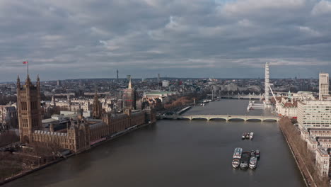 Aerial-drone-shot-towards-London-houses-of-parliament-palace-of-Westminster-London-eye