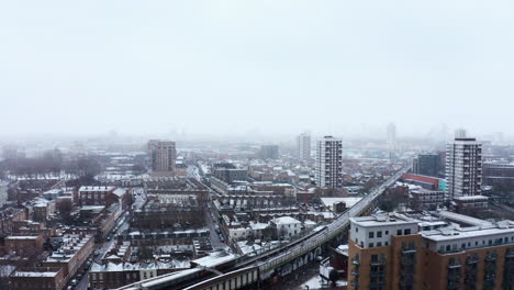 Drone-shot-over-heavy-snow-Limehouse-commercial-road-London