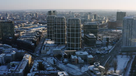Aerial-shot-of-Bratislava-downtown-Mlynske-Nivy-on-sunny-snow-winter-morning