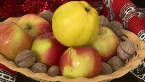 Apples,-quinces,-walnuts-in-a-basket