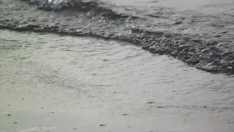 close-up-of-slow-motion-water-waves-on-the-beach