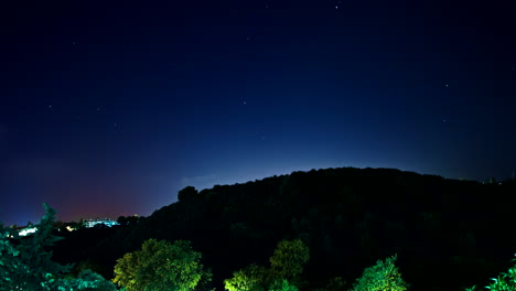 Clouds-and-stars-timelapse-on-countryside-hill