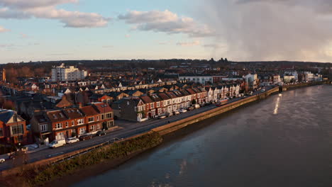 Stationary-drone-shot-of-Lonsdale-road-river-thames-west-London-sunset