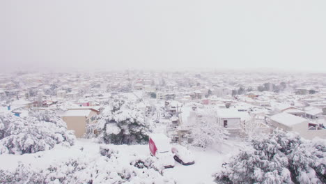 Snow-covered-rare-Medea-Winter-white-Athens-residential-urban-suburb-skyline-landscape